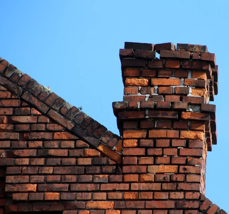 Blog Article - Damaged chimney on an St Clair Shores home showing cracks and missing mortar